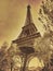 Eiffel tower in paris vintage photo sepia old textured effect