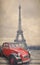 Eiffel Tower and red car with retro vintage style filter effect