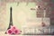 Eiffel tower with roses and perfume bottle