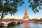 Eiffel tower and Seine river at golden sunset. Travel landmarks in Europe and France