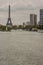 Eiffel tower and small statue of Liberty - Paris.