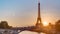 Eiffel Tower sunrise timelapse with boats on Seine river and in Paris, France.