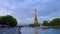 Eiffel Tower at sunset in summer. Most popular tourist landmark in France. Beautiful French tower at Champ de Mars, 5