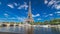 The Eiffel tower timelapse hyperlapse from embankment at the river Seine in Paris