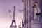 Eiffel tower from Trocadero, Paris, with view through wet glass window. (Retro style)