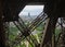 Eiffel Tower View Paris through iron grid