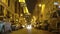 Eiffel Tower view from Paris street with parked cars and buildings, architecture