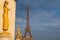 Eiffeltower in Paris with golden statues