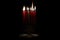 Eight burning candles on traditional jewish candelabra menorah