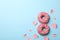 Eight made of donuts on blue background