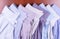 Eight multi-colored male shirts