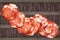 Eight Pork Salami Slices Set On Vintage Rustic Interlaced Parchment Place Mat Rough Grunge Surface