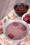 Eight treasures of health porridge in the dining tray and jujubes and raisins in the other two bowls