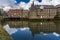 Eighteen-century mills reflected in the still waters of the River Lee in Lee Valley, London