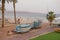 Eilat / Israel - 29 04 2019: View of the tourist area with people walking in the evening hotels shops beach cafes