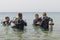 Eilat, Israel - May 2018: Scuba diving course. Men with breathing apparatus in sea