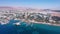 Eilat Shorline with Marina Boats Hotels and landscape Aerial