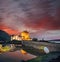 The Eilean Donan Castle with colorful sunset, Highlands of Scotland