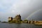Eilean Donan Castle in Scotland with a Rainbow