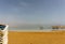 EIN BOKEK, ISRAEL - March 28, 2018: Solar beach on the Dead Sea with beach sunshades .