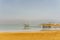 EIN BOKEK, ISRAEL - March 28, 2018: Solar beach on the Dead Sea with beach sunshades .