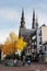 Eindhoven, Netherlands, November 2019.  Two belfries of the Catholic Church of St. Catherine, Eindhoven. Golden Autumn in