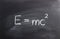 Einstein formula written on a chalkboard