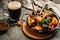 Eisbein with sauerkraut salad and beer, Oktoberfest menu, German cuisine