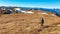 Eisenerzer Reichenstein - A man hiking on a an alpine pasture near Eisenerz in Styria, Austria. Wanderlust