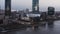 Ekaterinburg city center with Iset River and Yeltsin Center. Stock footage. Aerial view of cityscape with the city pond