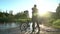 Ekaterinburg, Russia - August 2020: Old cyclist watches the sunset