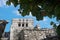 El Castillo Maya ruins framed by tropical plants, Tulum, Mexico