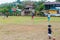 EL CASTILLO, NICARAGUA - MAY 6, 2016: Local girls play baseball in El Castillo village at San Juan river, Nicarag