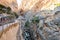El Chorro, Spain. El Caminito del Rey walkway along the steep walls of a narrow gorge, with dangerous old narrow metal bridge.
