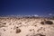 El Cotillo - Faro del Toston: View over dunes on  hotel buildung against blue sky