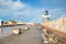 El Morro upper level, lighthouse, flags and rainbow