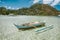 El Nido bay. Palawan island, Philippines. Filippino fishing boat in shallow water lagoon. Exotic travel destination