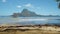 El Nido bay. Palawan, Philippines. Banca boat in sunny summer lagoon. Calm waves rolling on sandy beach coastline