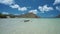 El Nido, Palawan island, Philippines. Slow motion of lonely filippino fishing boat floating in blue shallow water