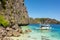 El Nido Palawan Philippines: Tropical landscape with boat, blue and crystal clear sea water, white sand and island