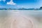 El Nido, Palawan, Philippines. Tropical scenery of banca boat on the sandy beach in low tide