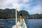 El Nido, the Philippines - 19 Nov 2018: boatman on fishing boat. Tropical island landscape. Palawan island hopping tour