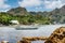 El Nido village and mountains, Palawan, Philippines. Bangka fishing in the bay shallow water