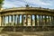 El Retiro public park in Madrid with construction of arches with columns in line,