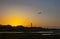 El Rompido lighthouse and marina at sunrise from marshlands