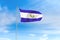 El Salvador flag over blue sky background