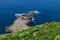 El Sauzal volcanic coastline, stone path and green vegetation