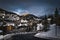 El Tarter village at dusk with lit street lamps in Pyrenees mountains, Grandvalira, Andorra