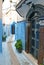 An elaborate door and narrow pedestrian walkway in the residential areas of the ancient Kasbah of the Udayas of the Moroccan