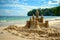 An elaborate sand castle stands on the sandy shore by the waters edge, blending into the natural landscape as a stunning